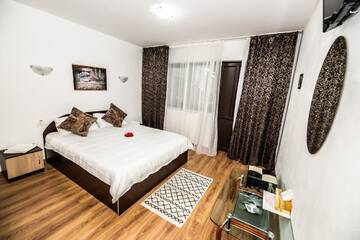 Фото номера Стандартный номер с кроватью размера &quot;queen-size&quot; Фермерские дома Casa de sub deal г. Bîltişoara 2